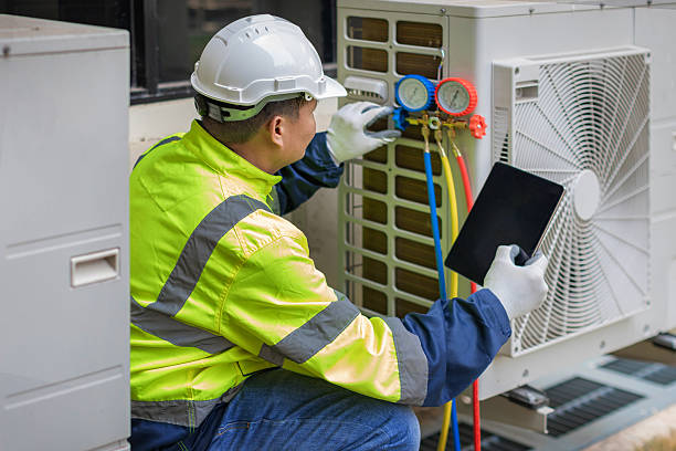 Professional Hvac technician working in Mission Hills, KS